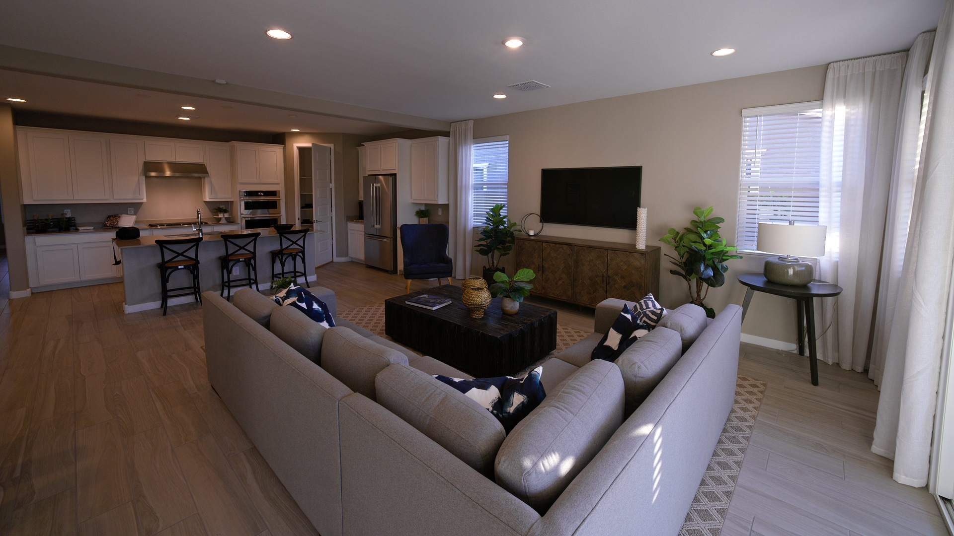Open living room and kitchen interior with natural light